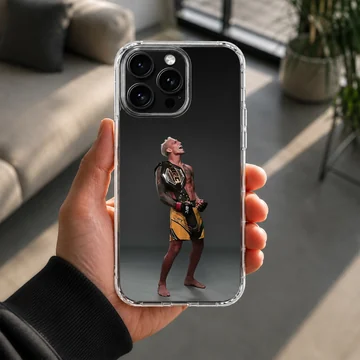 MMA champion holding a championship belt printed on a matte phone case — Lifestyle