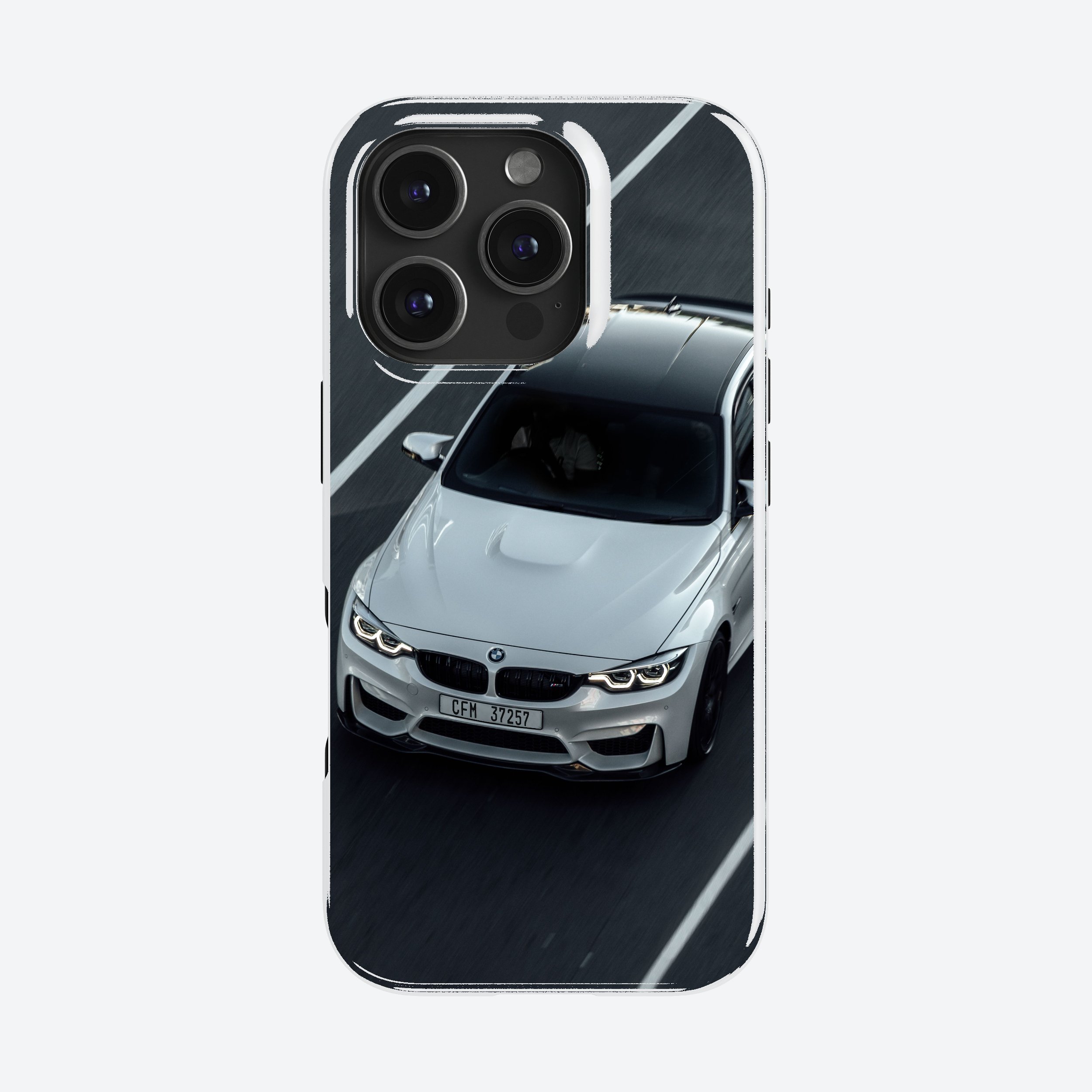 Finished custom phone case printed with a white BMW M4 photo, shown on an iPhone
